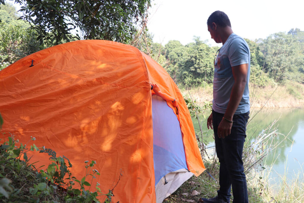 Camping with a orange tent